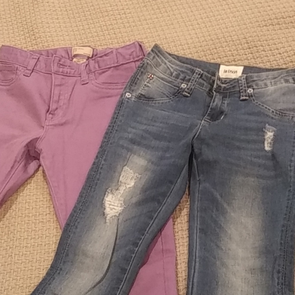 Two pairs of childrens jeans.